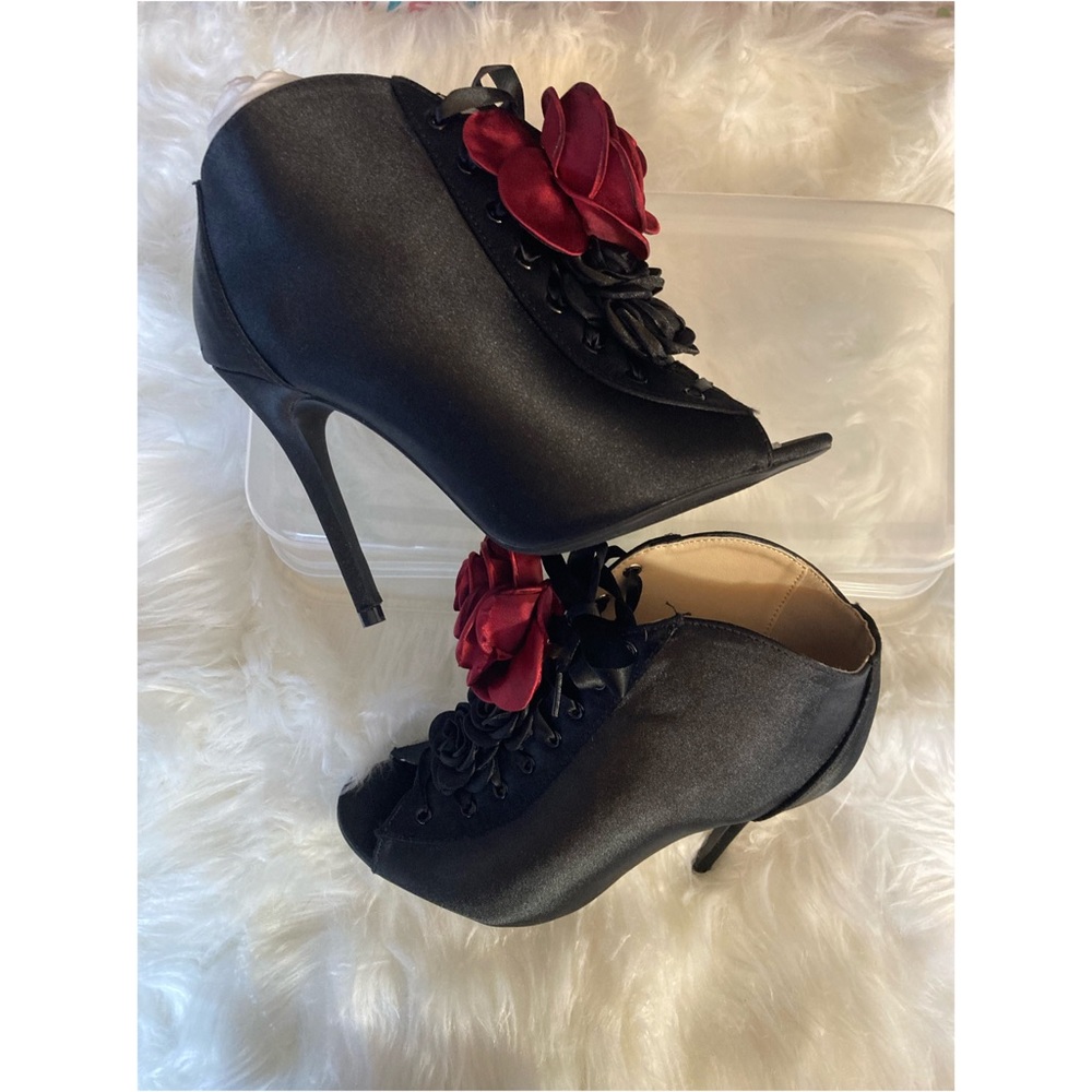 Quipid Black satin heel booties. Available in size 6 1/2 & 7.